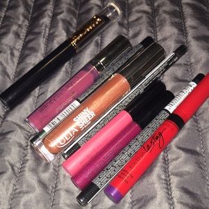 5 lip glosses, eyeshadow pencil , 3 eyeliners.